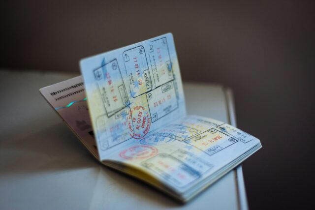 Schengen passport filled with European entry and exit stamps